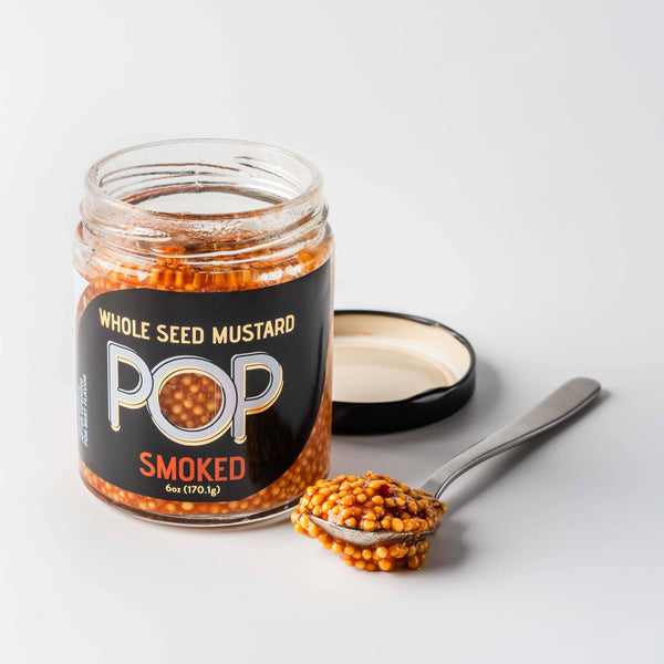 Pop smoked open displayed on spoon