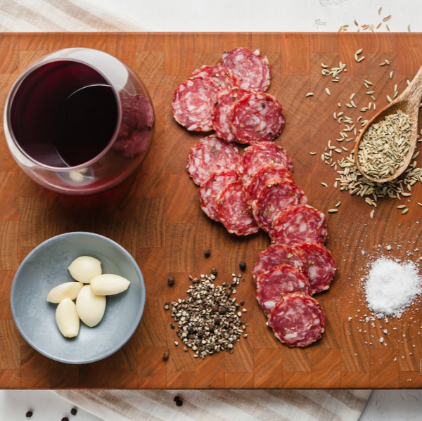 salami finnochiona slices on board with ingredients