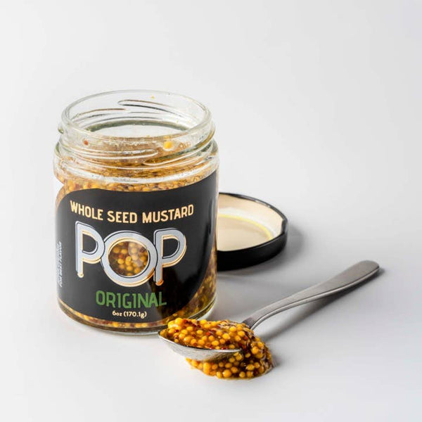 Pop Original whole seed mustard open on a spoon