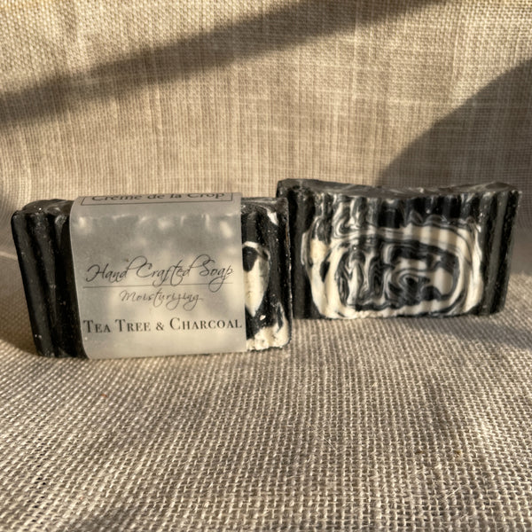 Soap - Tea Tree & Charcoal Tea Tree is known for its cleansing properties as well as it's antibacterial.  Activated Charcoal has been used for centuries to pull out toxins.  front label