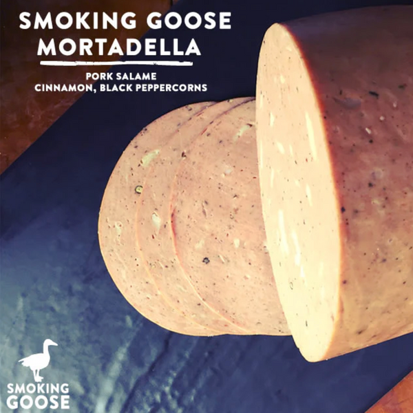 Smoking Goose Mortadella with ingredients listed on a blue background
