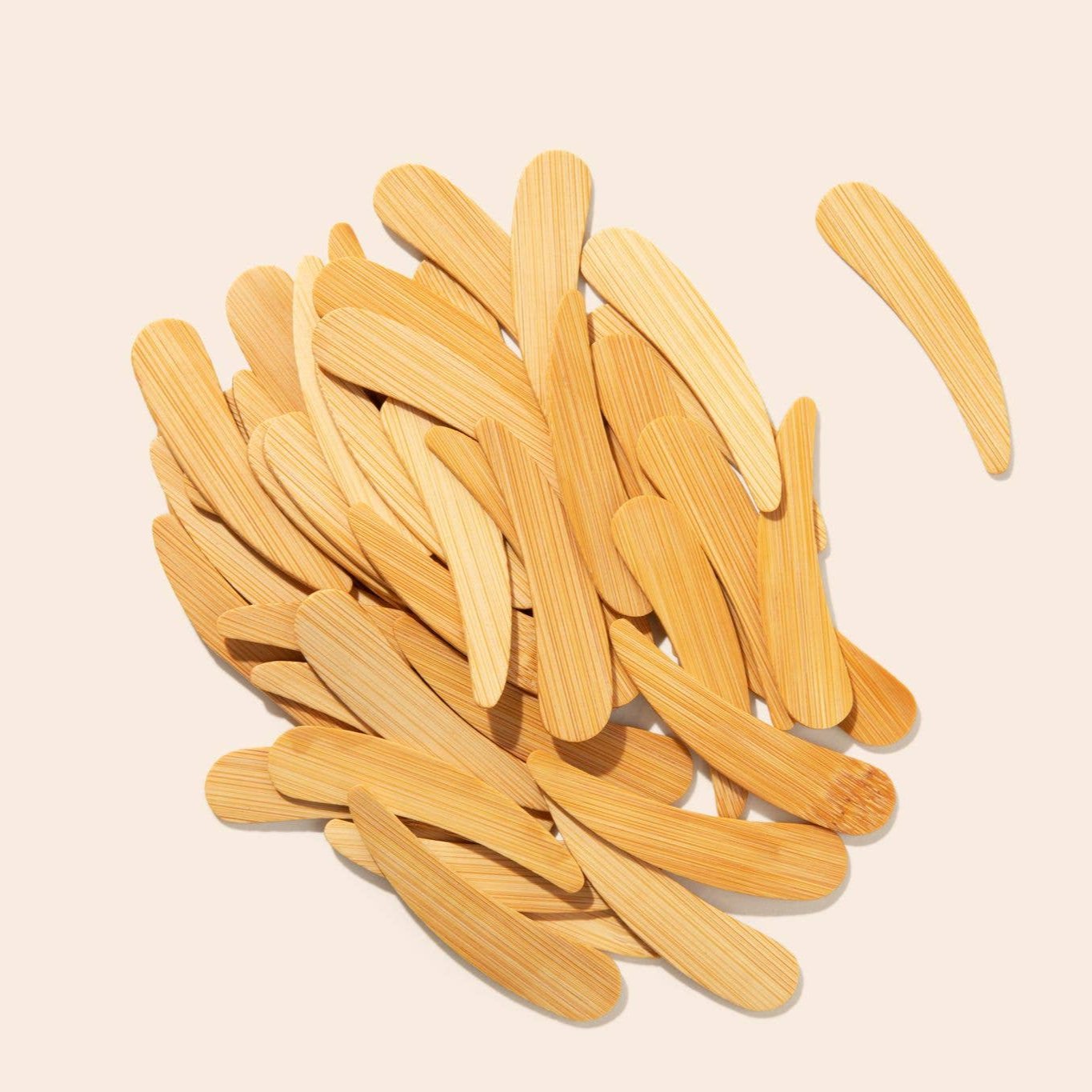 A pile of Bamboo Cream Applicators