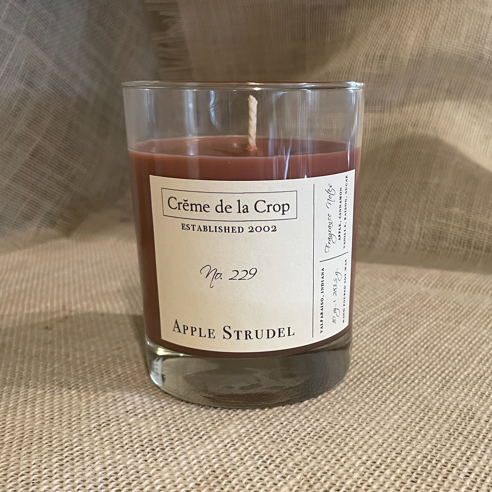 Soy Candle - Apple Strudel Our Apple Strudel Candle has warm bakery notes of vanilla and butter sprinkled with cinnamon and sugar.100% Soy Wax, Hand-Poured Candle front