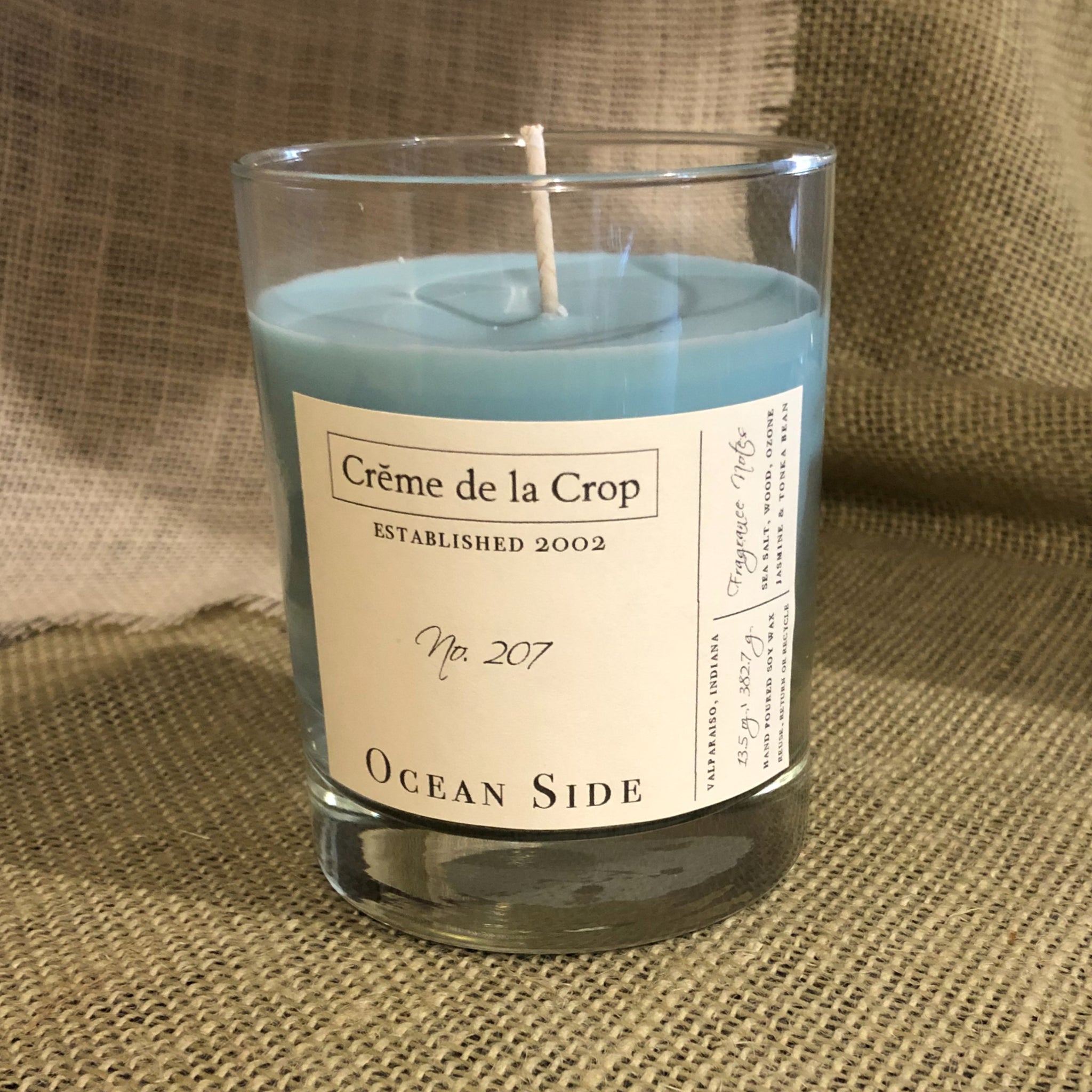 Soy Candle - Ocean Side 100% Soy Wax, Hand-Poured Candle - 13.5oz Fragrance Note:Green leaves, Jasmine, Lily of the Valley, Orange, Ozone Sea Salt, and Wood Tonka Bean front