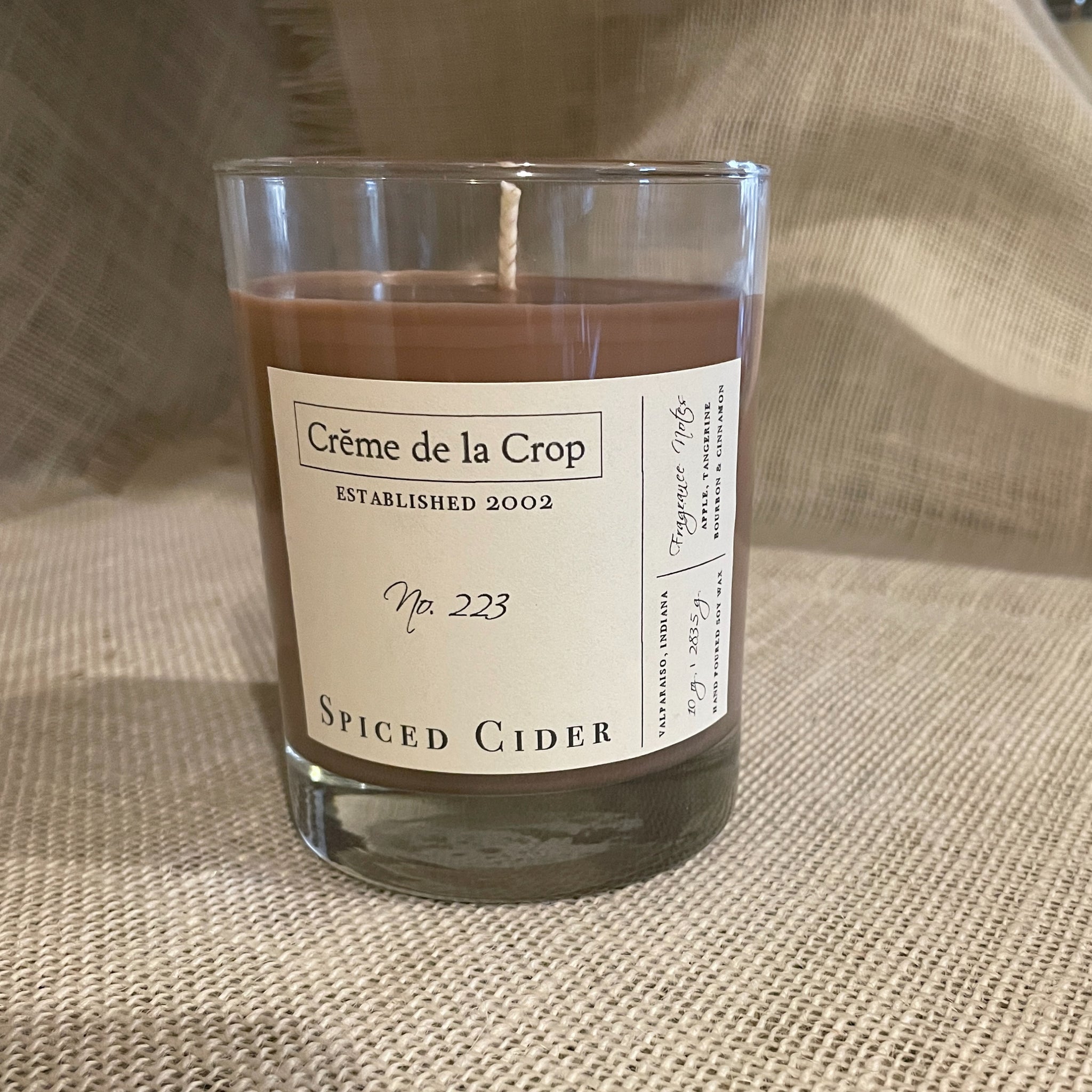 Soy Candle - Spiced Cider For an intriguing, upscale take on a traditional apple spice fragrance, try Spiced Cider. This mouthwatering, boozy scent starts with top notes of apple, cinnamon, front
