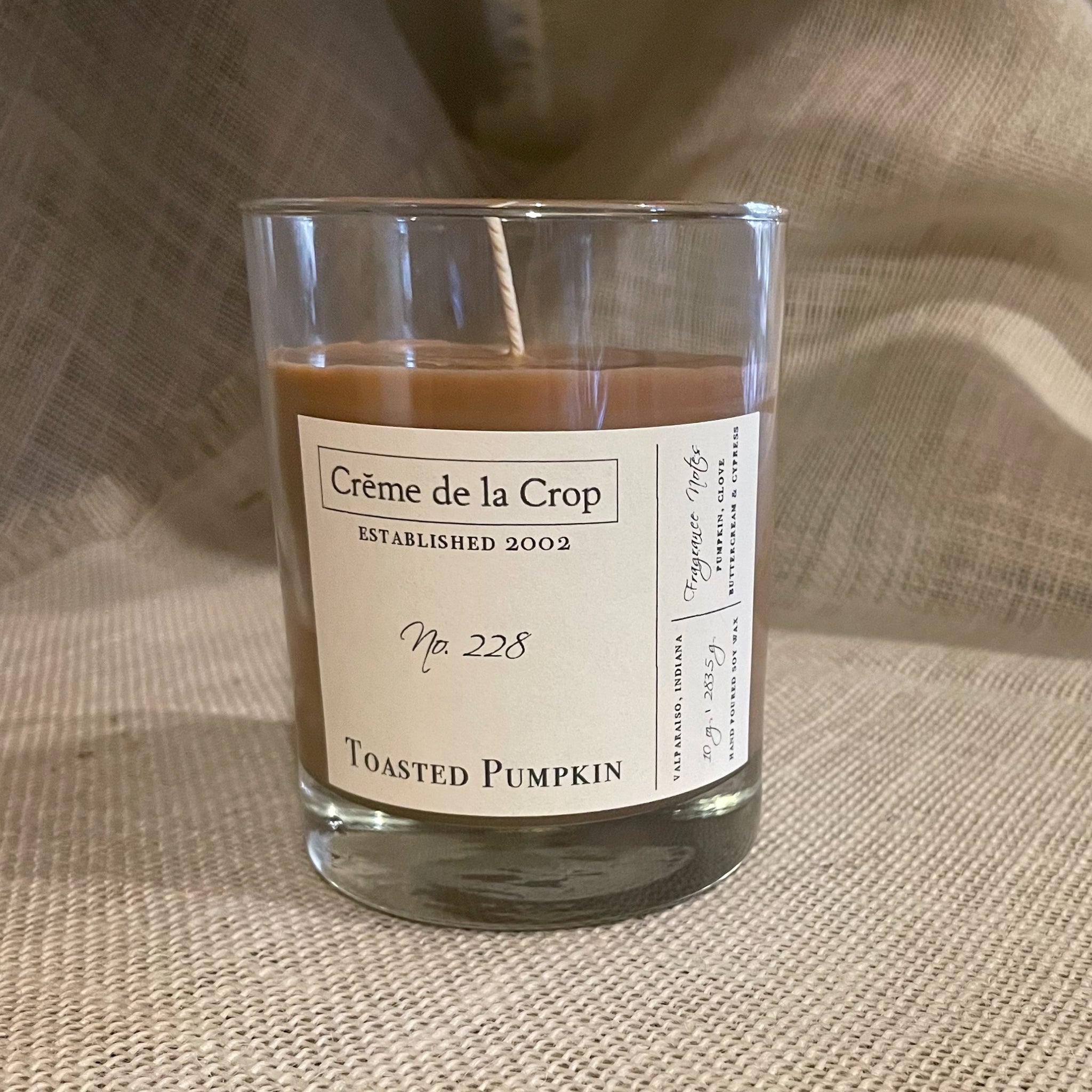 Soy Candle - Toasted Pumpkin Comforting and sweet with just the right amount of spice, our Toasted Pumpkin Candle will remind you of autumn festivals, pumpkin carving, and bonfires. front